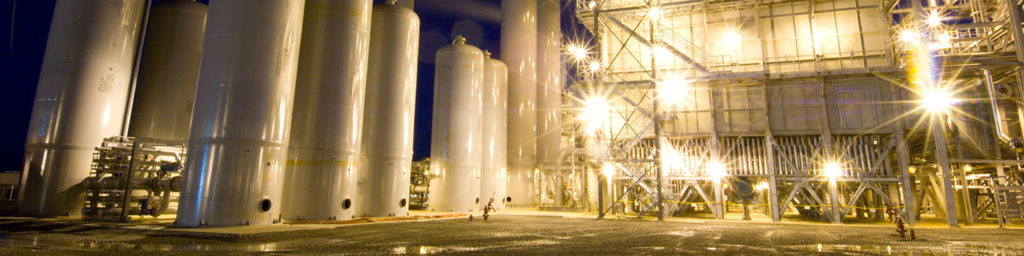 Nighttime photograph of the outside of a plant that leverages Rotoflow turbomachinery